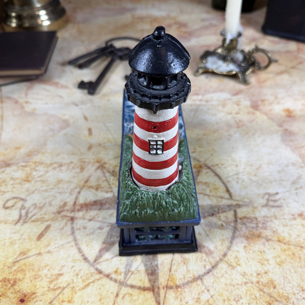 Cast Iron Lighthouse & Sailboat Mechanical Coin Bank | Bits & Pieces